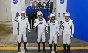 SpaceX Capsule Docks at Space Station with 4 Astronauts Onboard