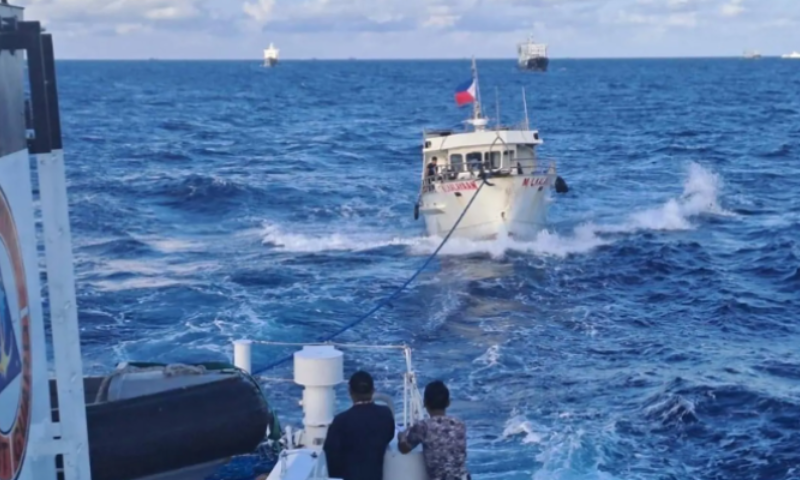 Beijing Warns Philippines of Resolute Reply in South China Sea