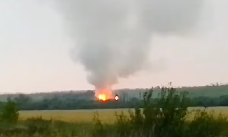 Ukrainian Drone Attack Sets Russian Munitions Depot Ablaze Near Border