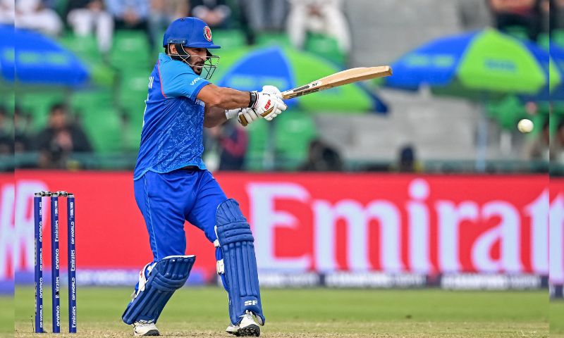 Afghanistan's Gulbadin Naib plays a shot during the ICC Champions Trophy one-day international (ODI) cricket match between Australia and Afghanistan at the Gaddafi Stadium in Lahore on February 28, 2025.