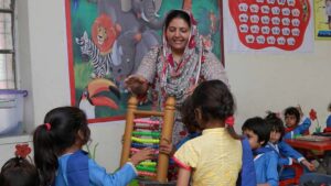 Primary Schook teacher Photo during handling class