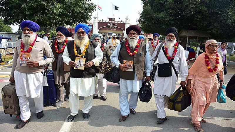 Sikh Pilgrims Return to India Through Wagah Border