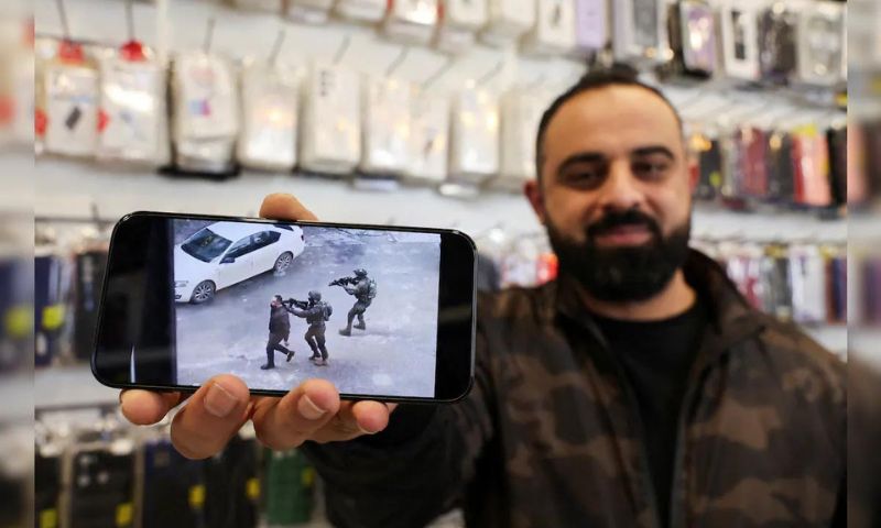 Palestinian, Shop, Owner, Israeli, Troops, West Bank, Raid, Human Shield, Dura, Mobile Phone, Footage, Israeli Military, Hamas,
