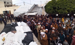 Palestinians Mourn Relatives Outside Gaza's Al Aqsa Hospital