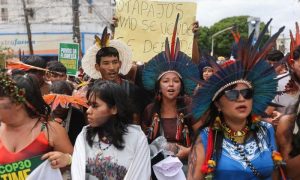 Protest inside COP30 venue as climate talks head into overtime in Brazil