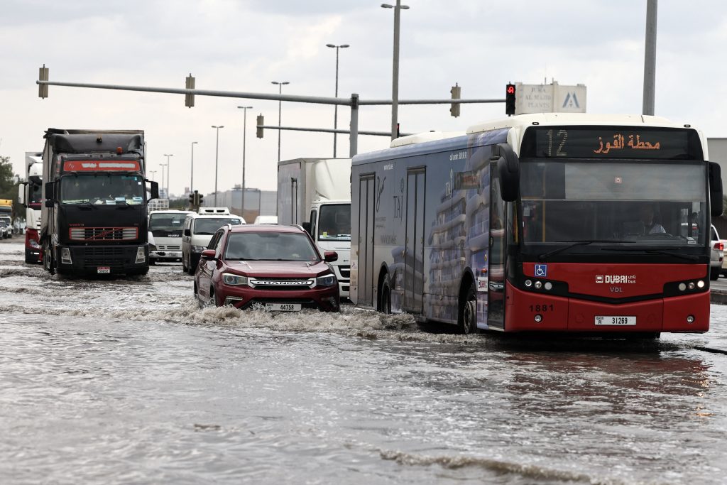 AFP 20251219 88LY4DJ v3 HighRes UaeWeatherFloods