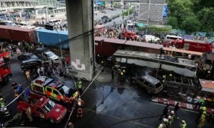 Freight Train Collides with Bus in Bangkok, Killing At Least Eight