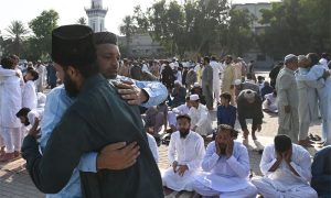 Pakistani Muslims wish for peace during Eid al-Adha
