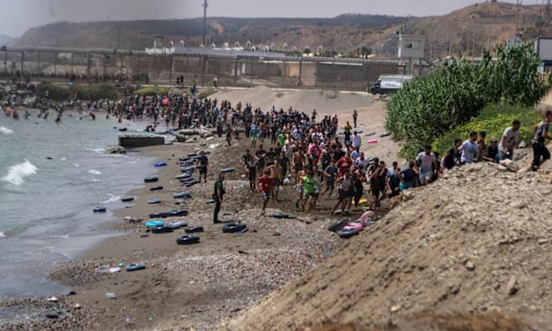 At Least 34 Dead as Tens of Thousands of Migrants Cross Into Spain's Ceuta