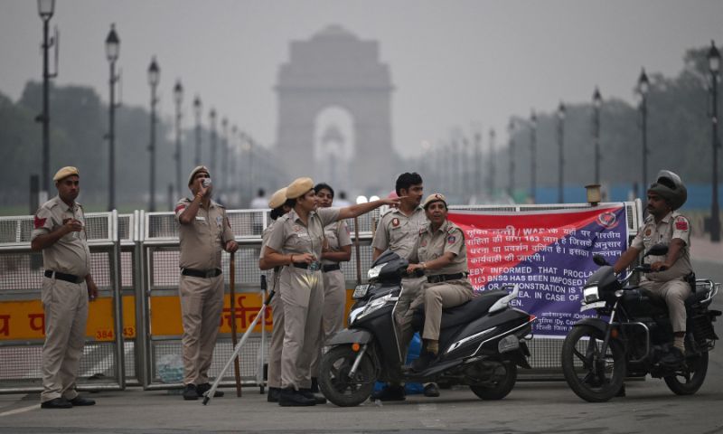 Indian Security Personnel Detain Protesters in New Delhi